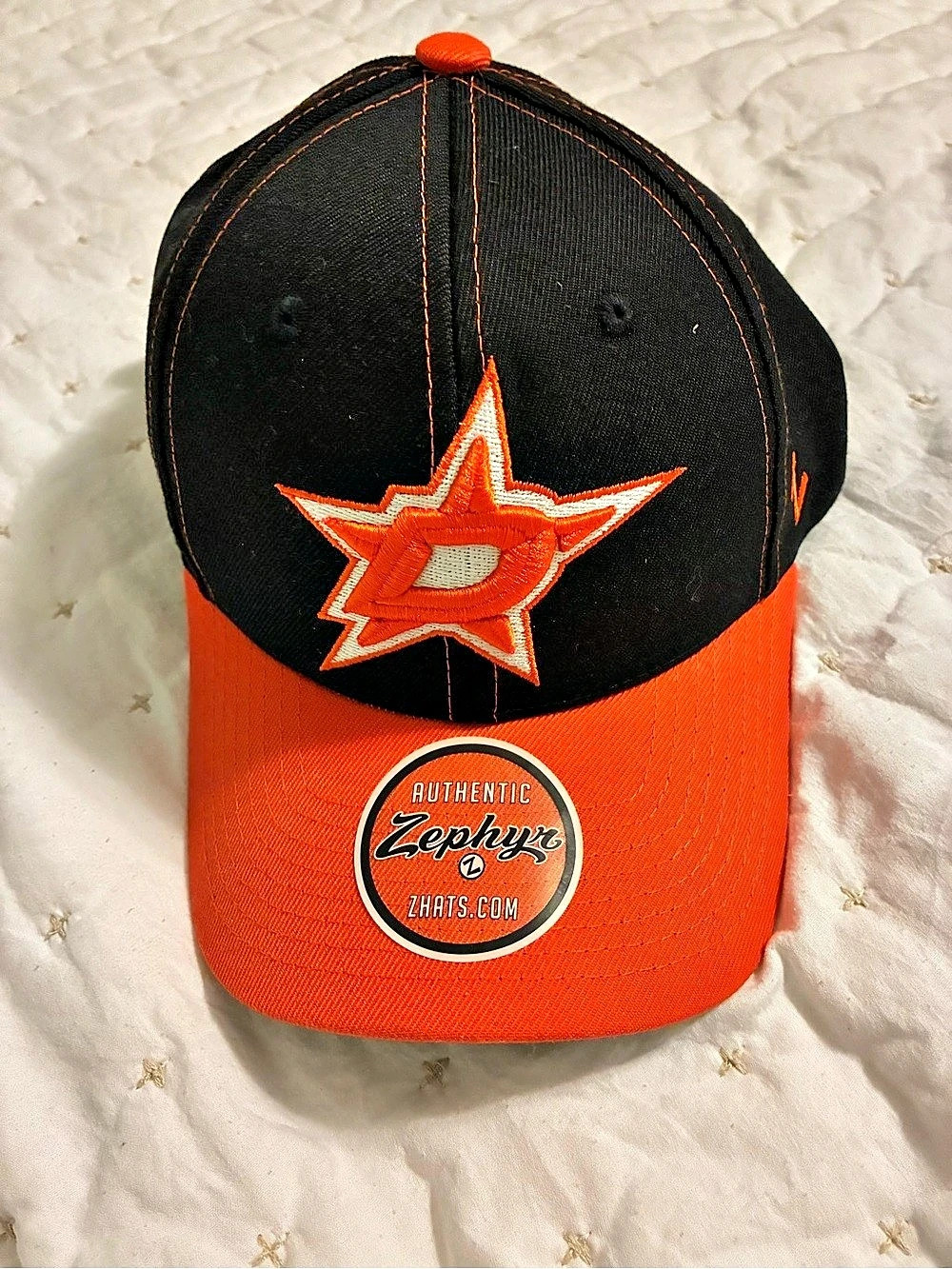 Zephyr Black & Orange Hat